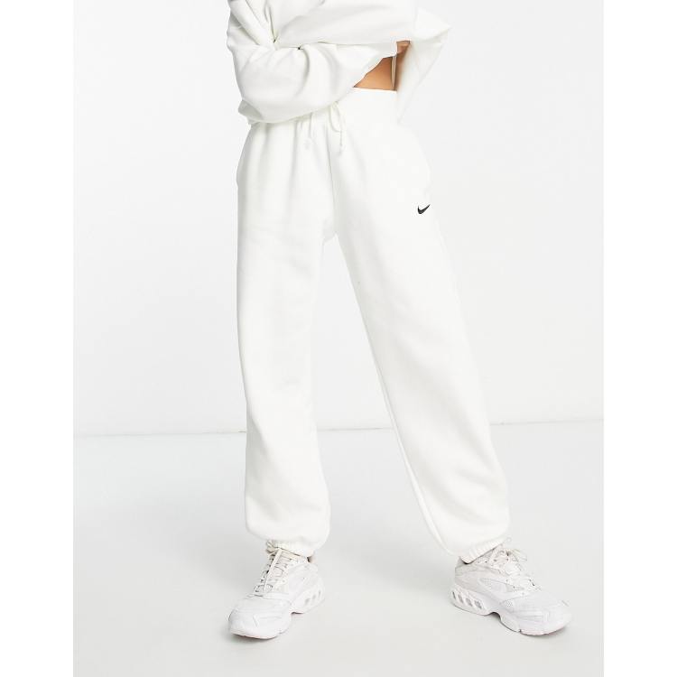 Nike mini swoosh oversized high rise joggers in sail white ASOS