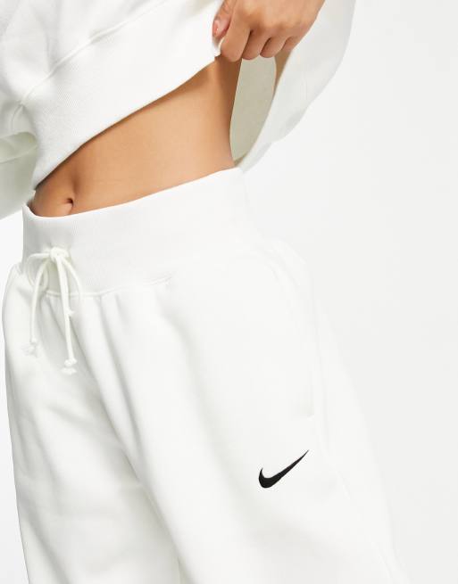 Nike mini swoosh oversized high rise joggers in sail white