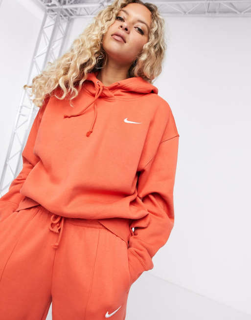 Nike mini swoosh oversized tracksuit in red