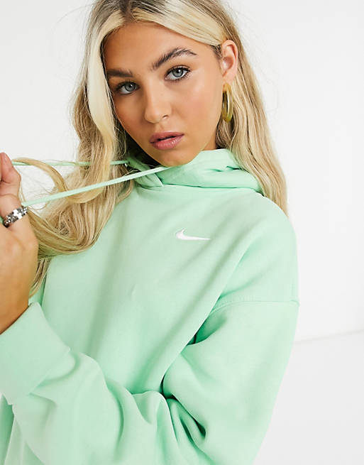 Materialisme Lieve scheerapparaat Nike mini swoosh oversized hoodie in washed neon green | ASOS
