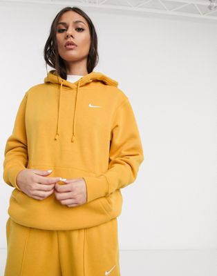 nike mini swoosh oversized yellow hoodie
