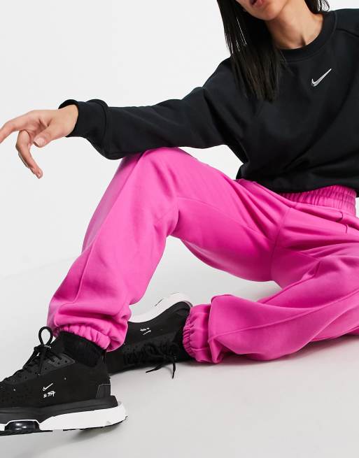 Nike mini swoosh oversized jogger in fuchsia pink