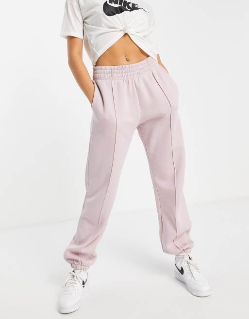 Nike mini swoosh oversized joggers in purple, ASOS