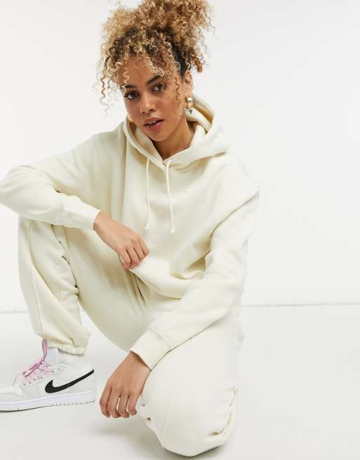 Nike mini swoosh oversized jogger in off white