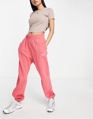 Nike mini swoosh oversized joggers in archaeo pink | ASOS