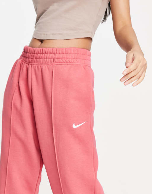 Nike mini swoosh oversized joggers in archaeo pink