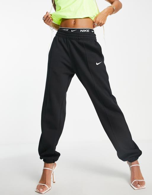 Nike swoosh oversized joggers in black new arrivals