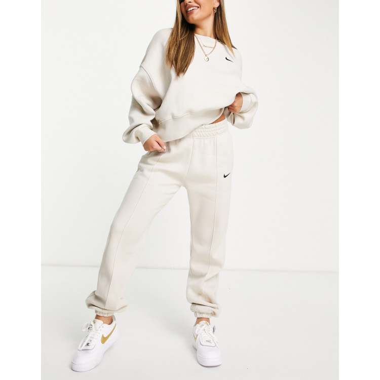 Nike mini swoosh oversized black tracksuit hot sale