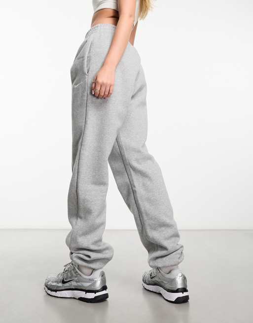 Nike mini Swoosh oversized joggers in grey ASOS