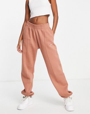 Nike mini swoosh oversized joggers in mineral clay | ASOS