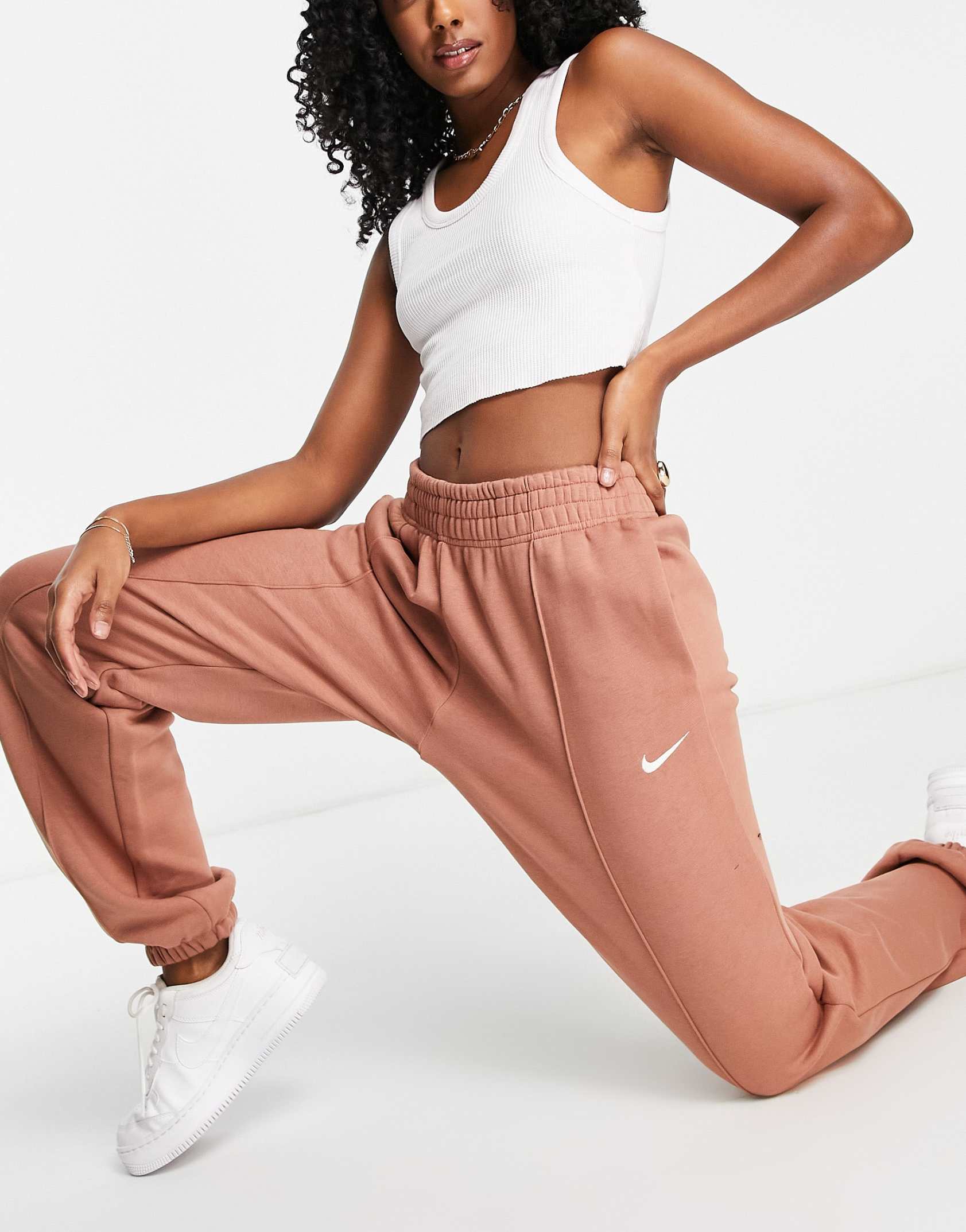 Nike mini swoosh oversized joggers in mineral clay - Price Checker