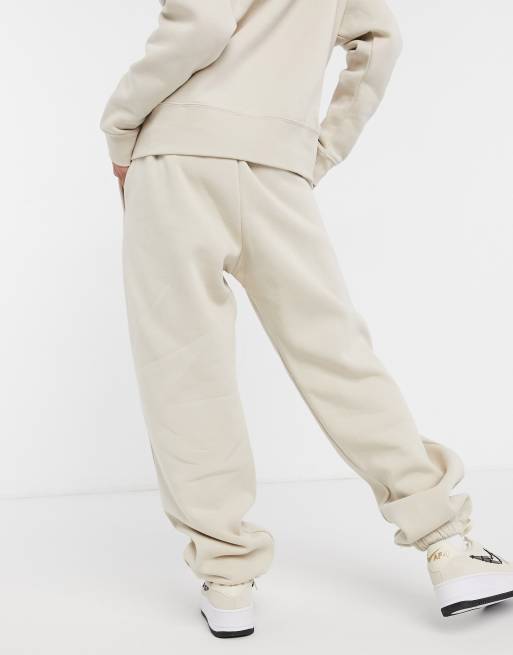 Nike mini swoosh oversized joggers in oatmeal