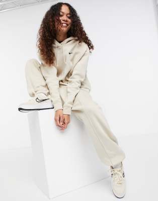 Nike mini swoosh oversized joggers in 