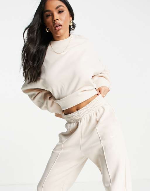 Nike mini swoosh oversized tracksuit in pearl white