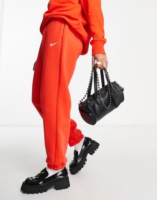 Nike mini swoosh oversized joggers in purple, ASOS