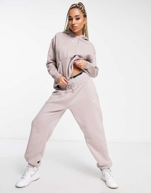 Asos nike 2025 swoosh joggers