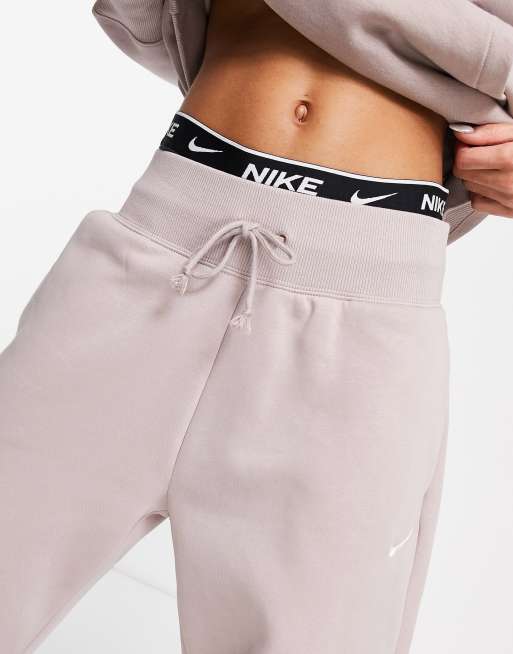 Nike mini swoosh oversized joggers in mineral clay, ASOS