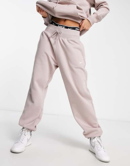 Nike Mini Swoosh oversized joggers in taupe-Grey, £59.50