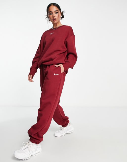 Nike Mini Swoosh oversized joggers in team red