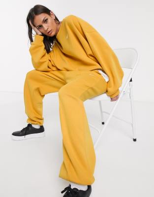 nike tracksuit yellow