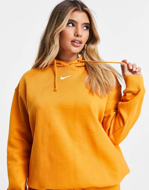 Hick slogan Afkorten Nike mini swoosh oversized pullover hoodie in orange | ASOS