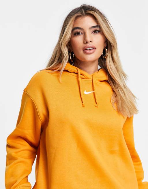 Nike mini swoosh oversized pullover hoodie in orange