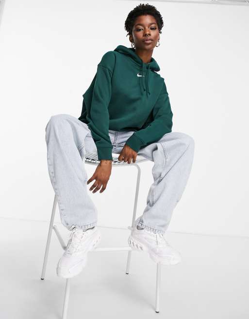 Nike Plus mini swoosh oversized hoodie with tuck sleeve detail in green -  ShopStyle Activewear Tops