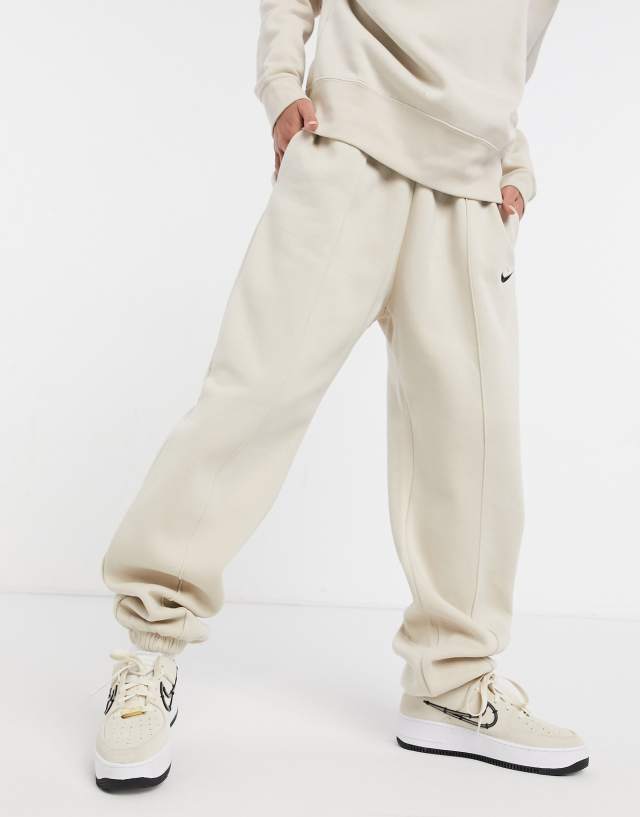 Nike mini swoosh oversized sweatpants in cream - CREAM