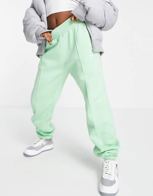 Nike mini swoosh oversized sweatpants in green | ASOS