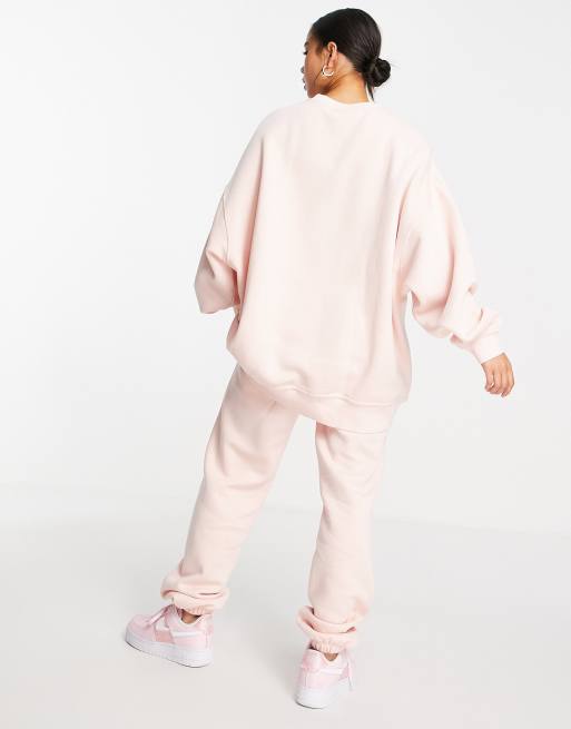 Nike mini Swoosh oversized sweatshirt in pale coral, 2 of 4