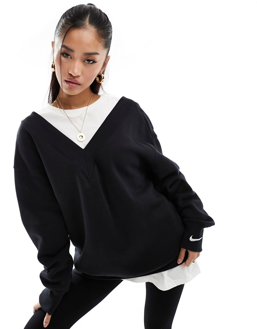 Nike mini swoosh oversized v-neck fleece sweatshirt in black
