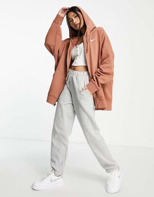 Nike mini swoosh oversized joggers in mineral clay, ASOS