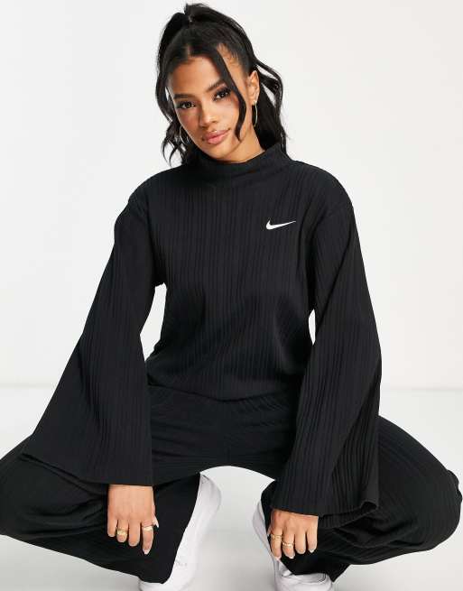 Nike mini swoosh ribbed jersey long sleeved top in black