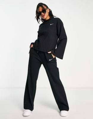 Nike mini swoosh ribbed jersey wide leg trousers in black