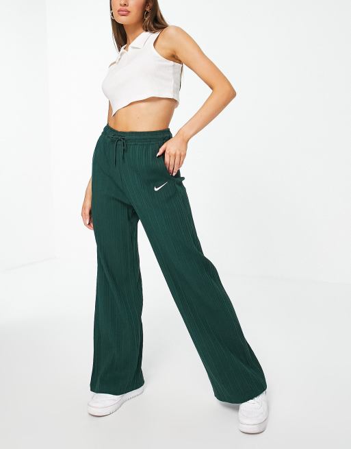 Nike mini swoosh ribbed jersey wide leg trousers in pro green ASOS