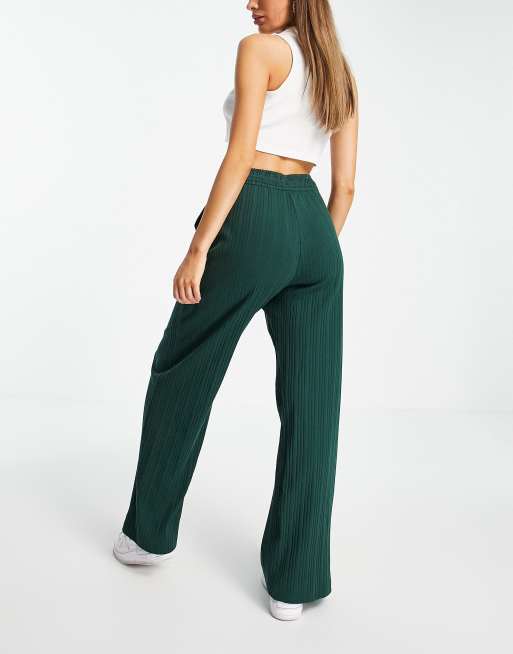 Nike mini swoosh ribbed jersey wide leg trousers in pro green