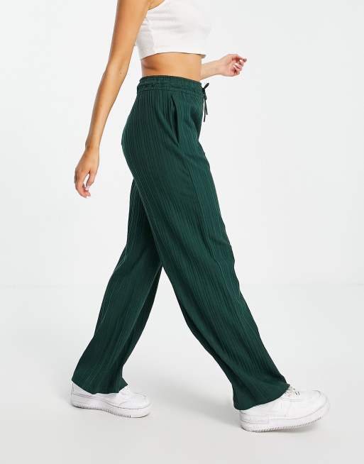 Nike mini swoosh ribbed jersey wide leg trousers in pro green