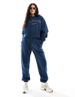 Mini Swoosh sweatpants in navy