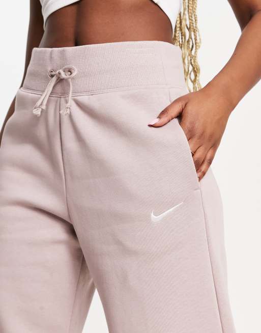 Nike mini swoosh high waisted wide leg joggers in black, ASOS