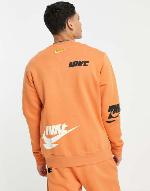 Nike Multi Futura crew neck fleece sweatshirt in dusty orange