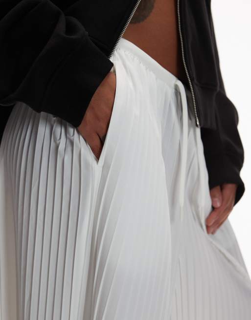 Nike – Naturvita, plisserade culotte-byxor med medelhög midja, 5 av 5