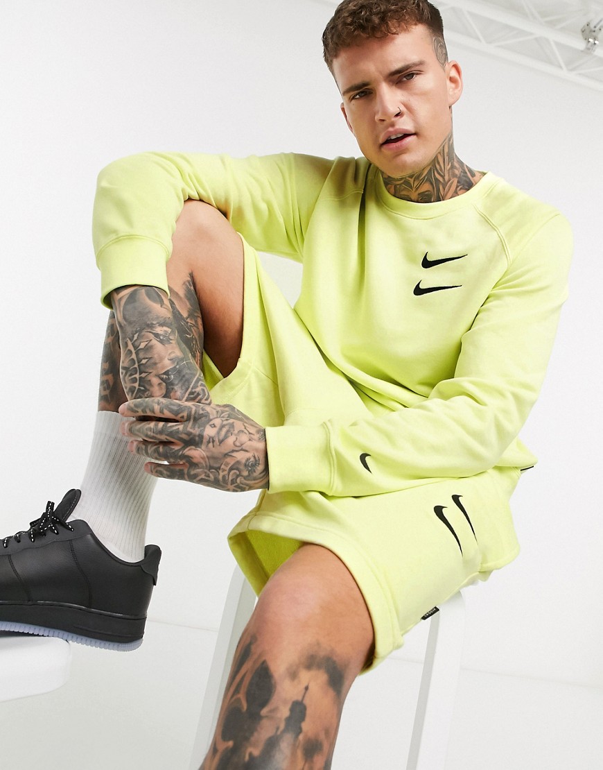 Nike – Neongul sweatshirt med rund halsringning och swoosh-logga