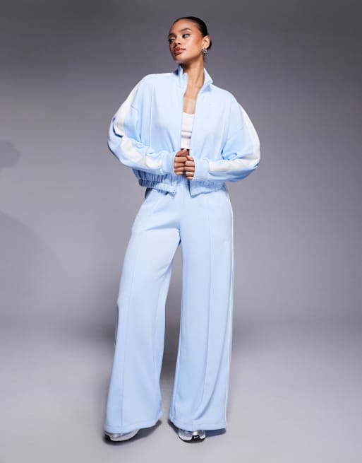 Nike NSW cropped zip through jacket in blue | ASOS