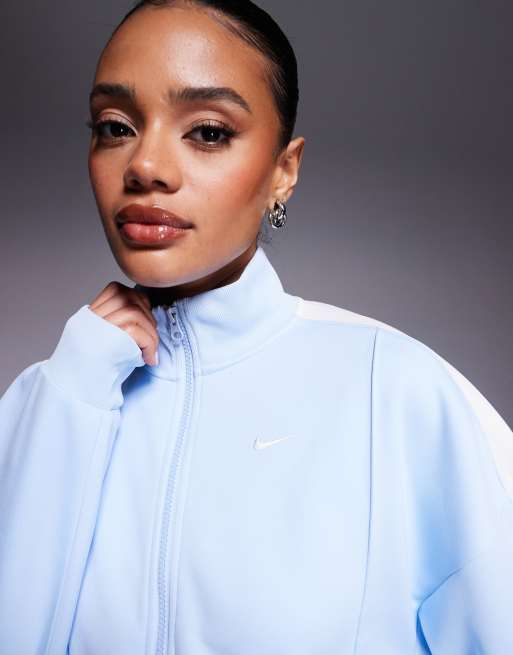 Nike NSW cropped zip through jacket in blue | ASOS