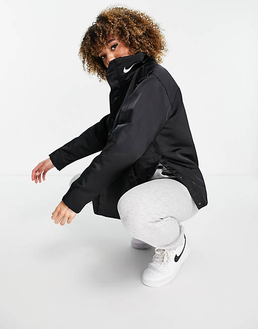 Nike nylon logo jacket in black | ASOS