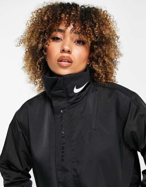 Nike nylon logo jacket in black | ASOS