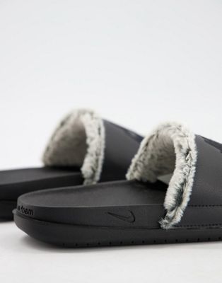 nike offcourt sliders in black with fur