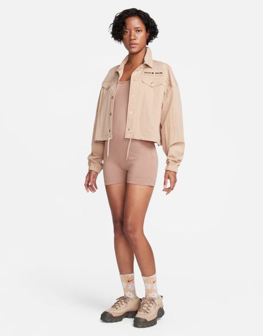 Nike one piece jumpsuit with tape detail in beige