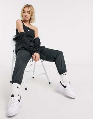 nike one shoulder buckle crop top in black