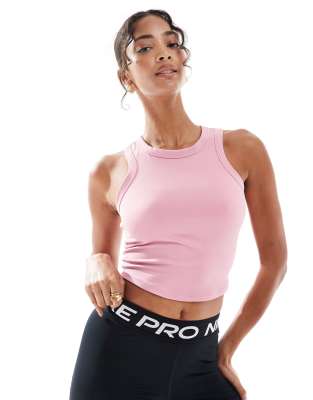 Nike One Training Dri-FIT cropped vest in pink - view 1